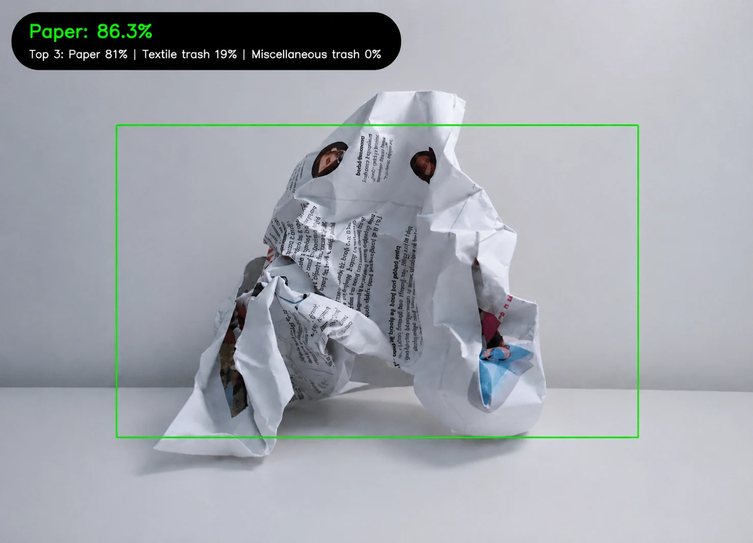 Live waste classifier identifying a crumpled paper object with 86.3 percent confidence